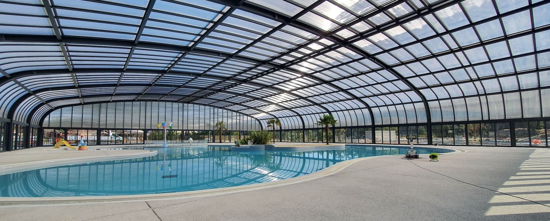 Pool Enclosures for Public Swimming Pools: Benefits, Efficiency, and Long-Term Value